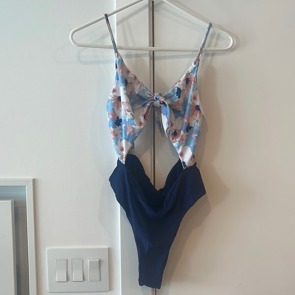 Cute Woman’s One Piece Suit